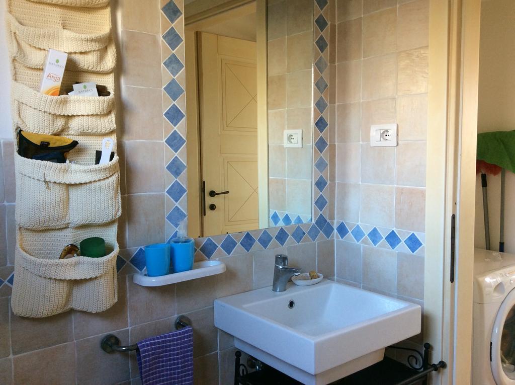 Sardinia Beach Apartments อาเญ็นตู ภายนอก รูปภาพ
