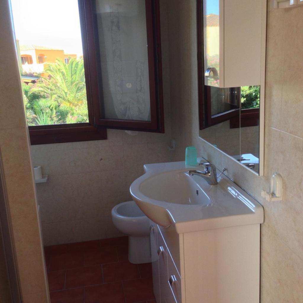 Sardinia Beach Apartments อาเญ็นตู ภายนอก รูปภาพ